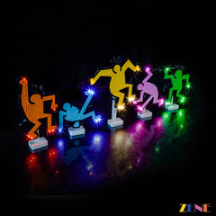 Colorful LED dancing figures on a dark background ZENE Bricks